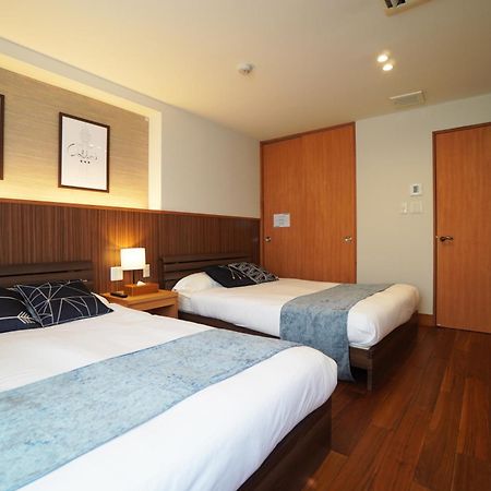 Apartamento Tsurigane Building Osaka Exterior foto
