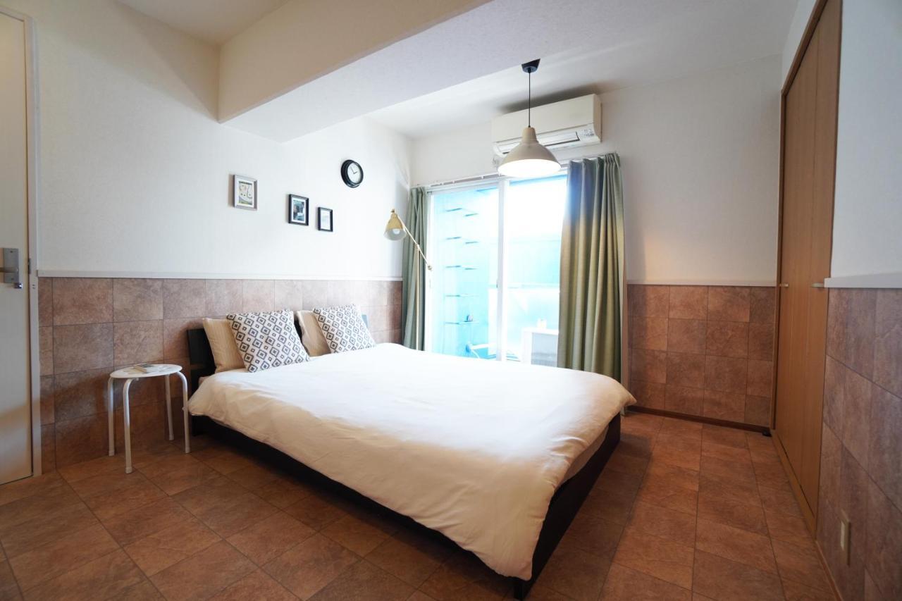 Apartamento Tsurigane Building Osaka Exterior foto