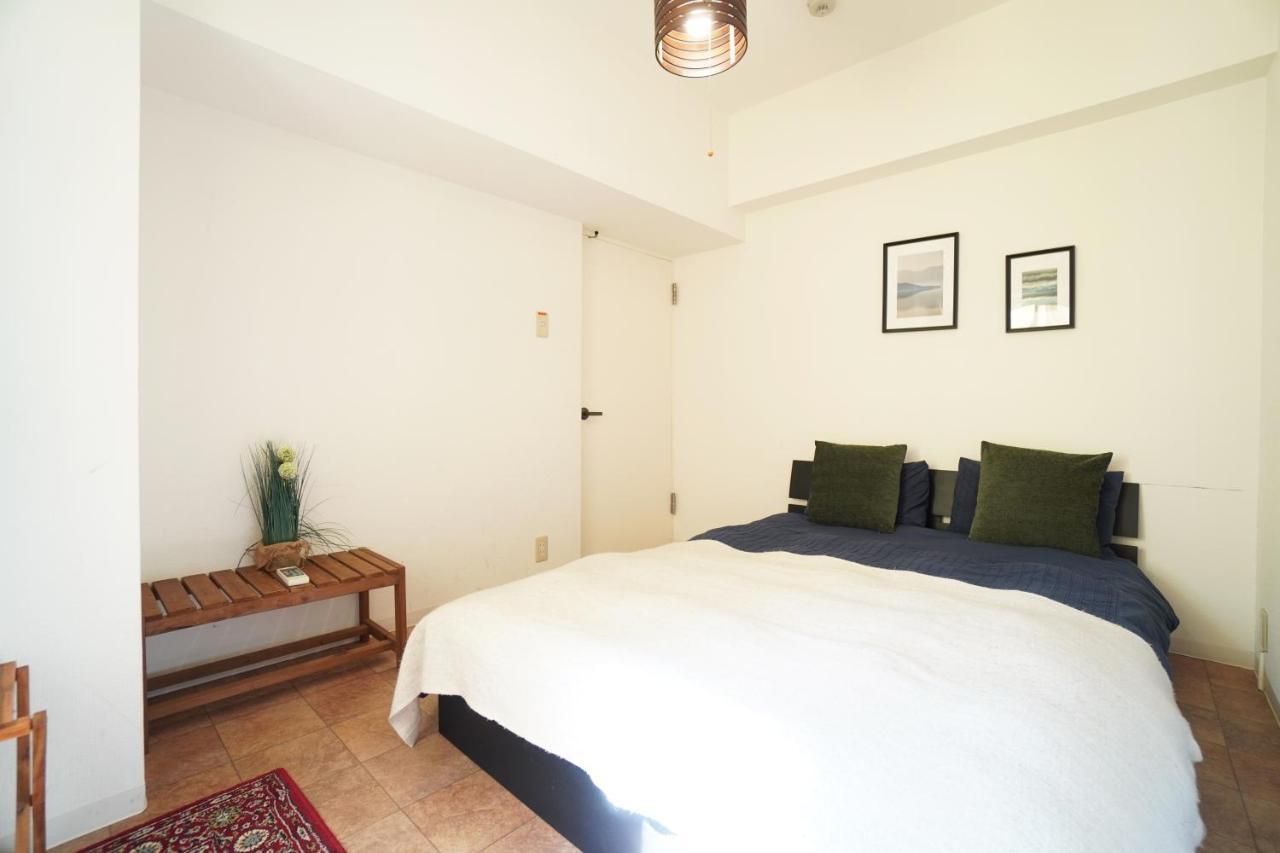 Apartamento Tsurigane Building Osaka Exterior foto