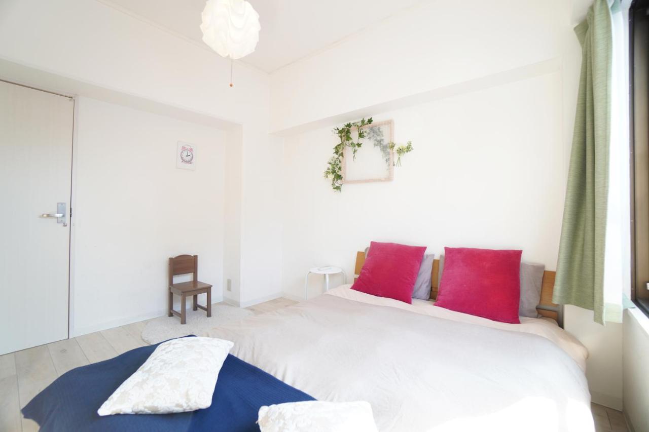 Apartamento Tsurigane Building Osaka Exterior foto